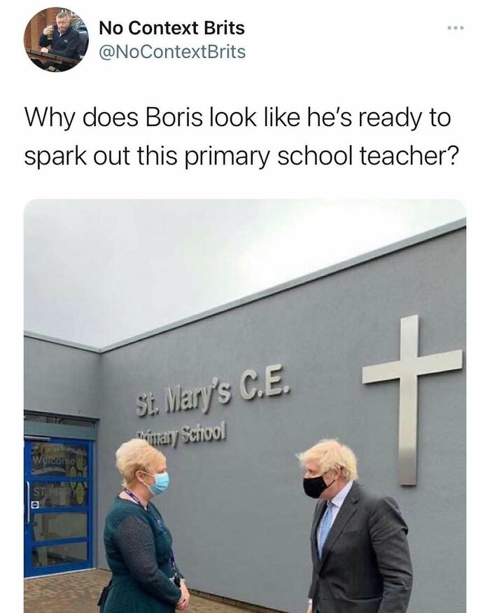 Two people in masks talking outside St. Mary's C.E. Primary School in a humorous "Growing Up British" meme context.