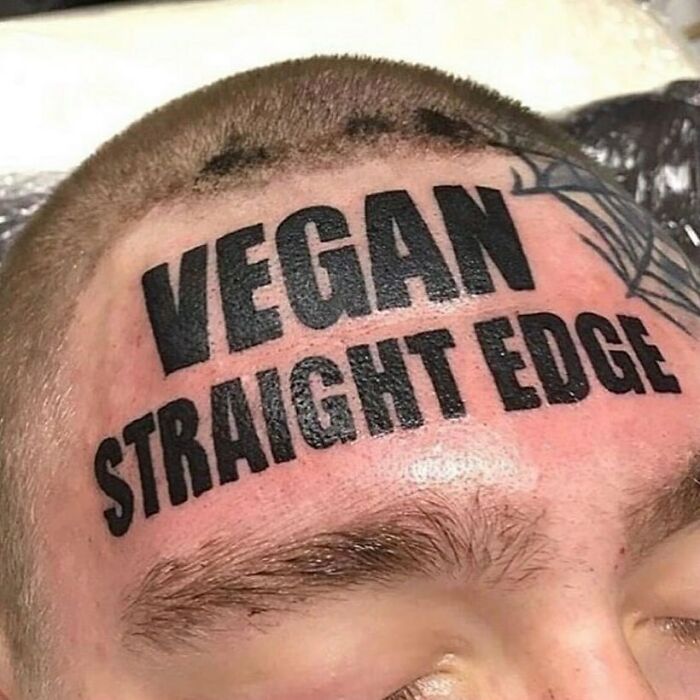 A forehead tattoo reading "Vegan Straight Edge" as an example of permanent mistakes inked on bodies.