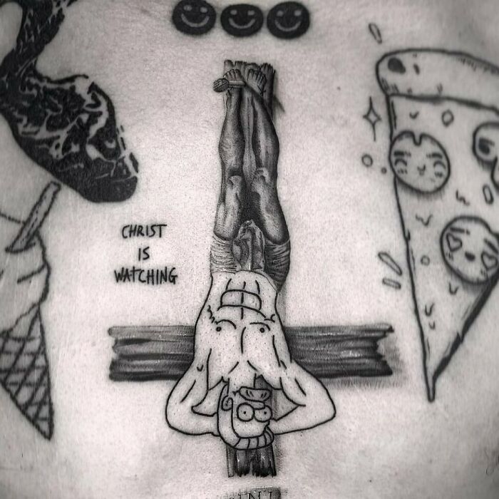Simpsons tattoo featuring Homer upside down on a cross with text "Christ is Watching," surrounded by ice cream and pizza designs.