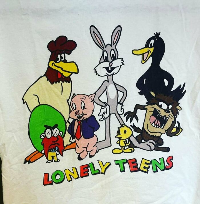 Cartoon characters on a T-shirt with "Lonely Teens," highlighting a humorous translation error.