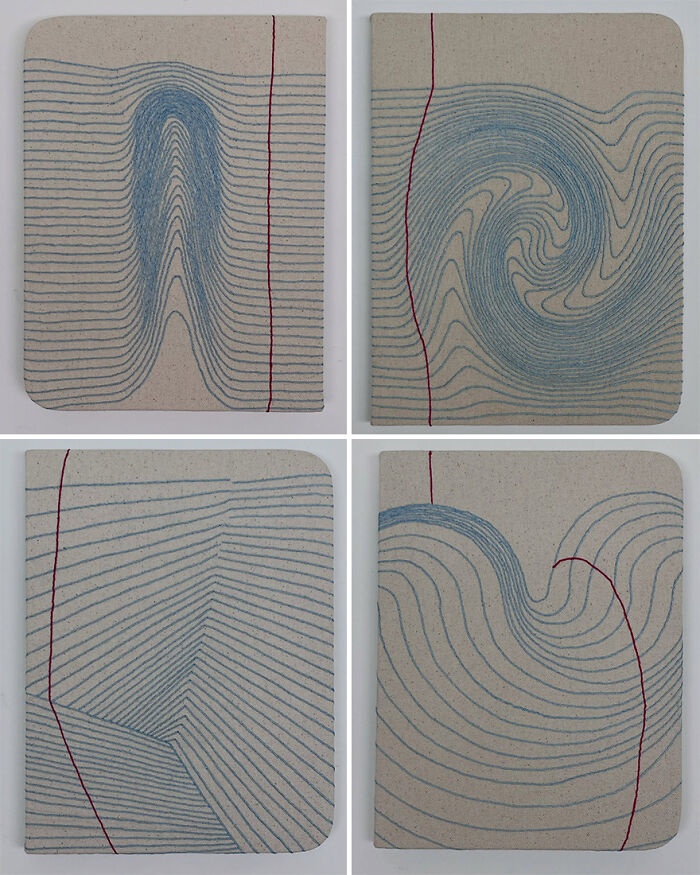 Embroidered fabric art resembling books with lined and swirling patterns.