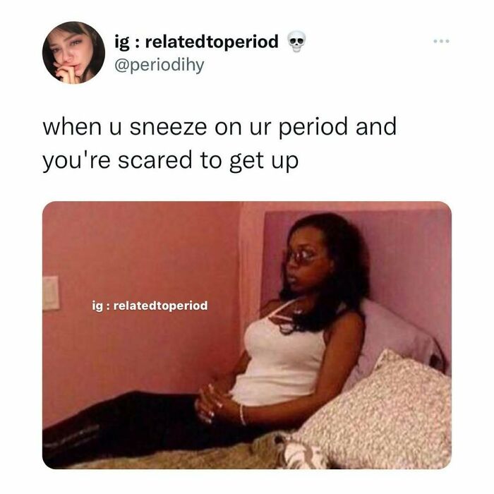 Woman sitting nervously on bed with caption about sneezing during her period, highlighting period humor.