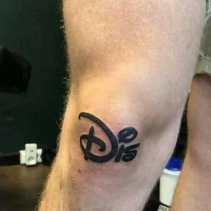 Tattoo mistake resembling famous brand logo inked on a person's knee.