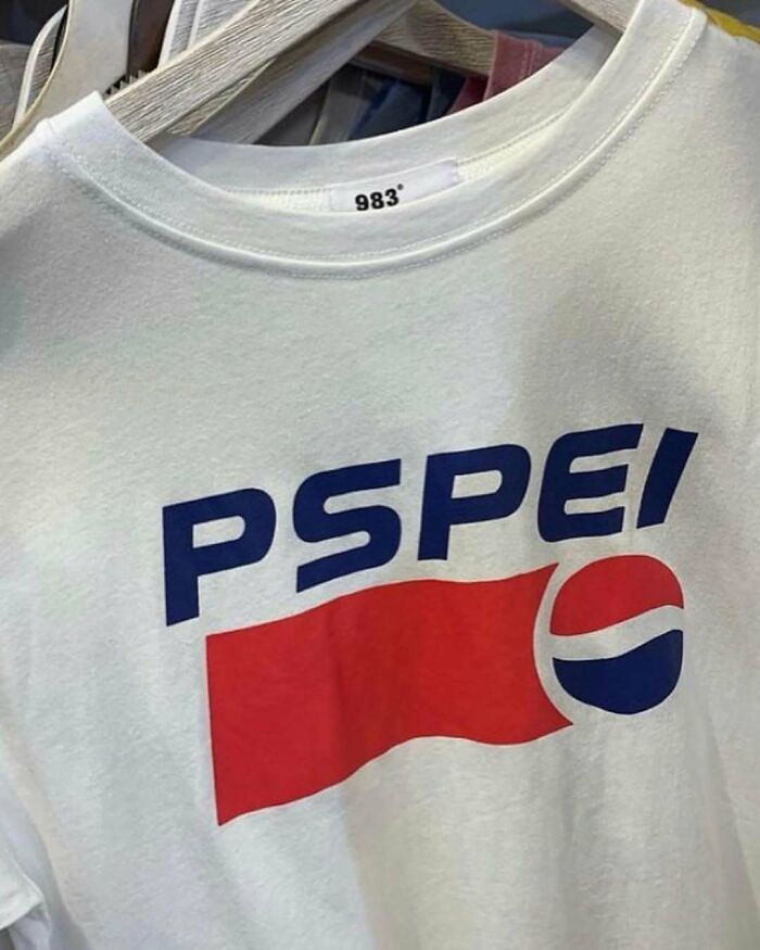 T-shirt design with "PSPE!" logo, humorously lost in translation.
