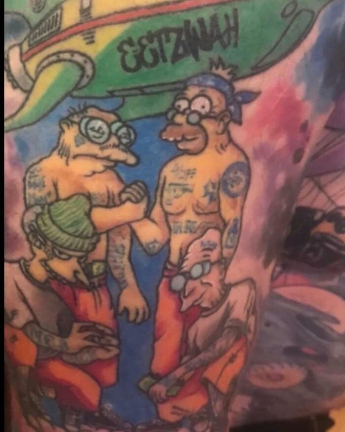 Unique Simpsons tattoo with colorful characters displaying quirky features.