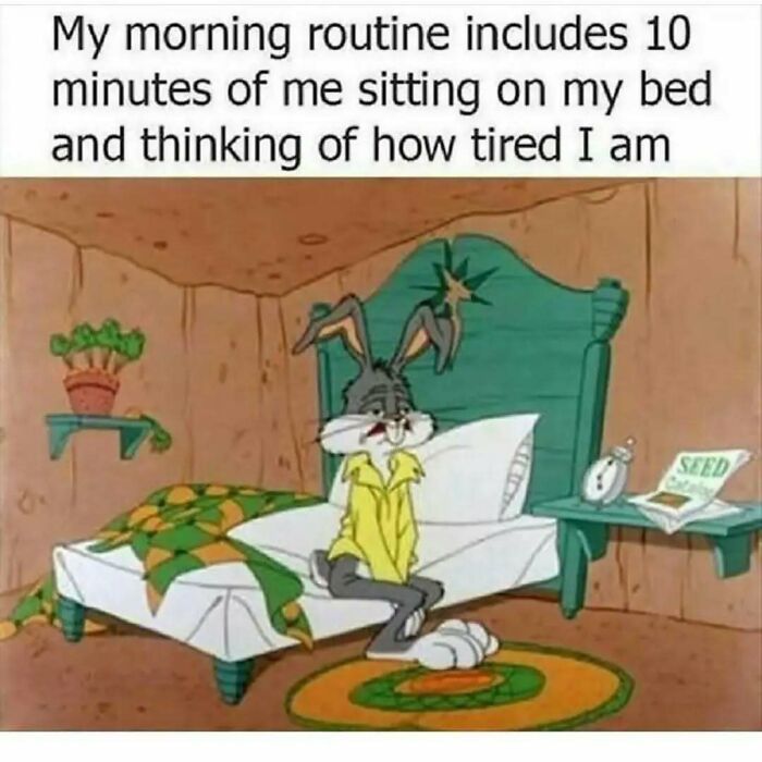 Funny relatable work meme shows a tired rabbit waking up, sitting on bed and contemplating exhaustion.