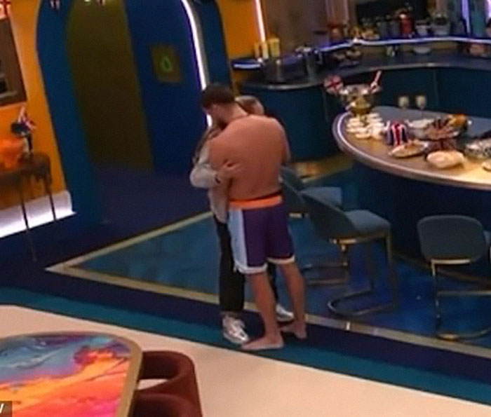 JoJo Siwa shares an intimate moment in the Big Brother kitchen.