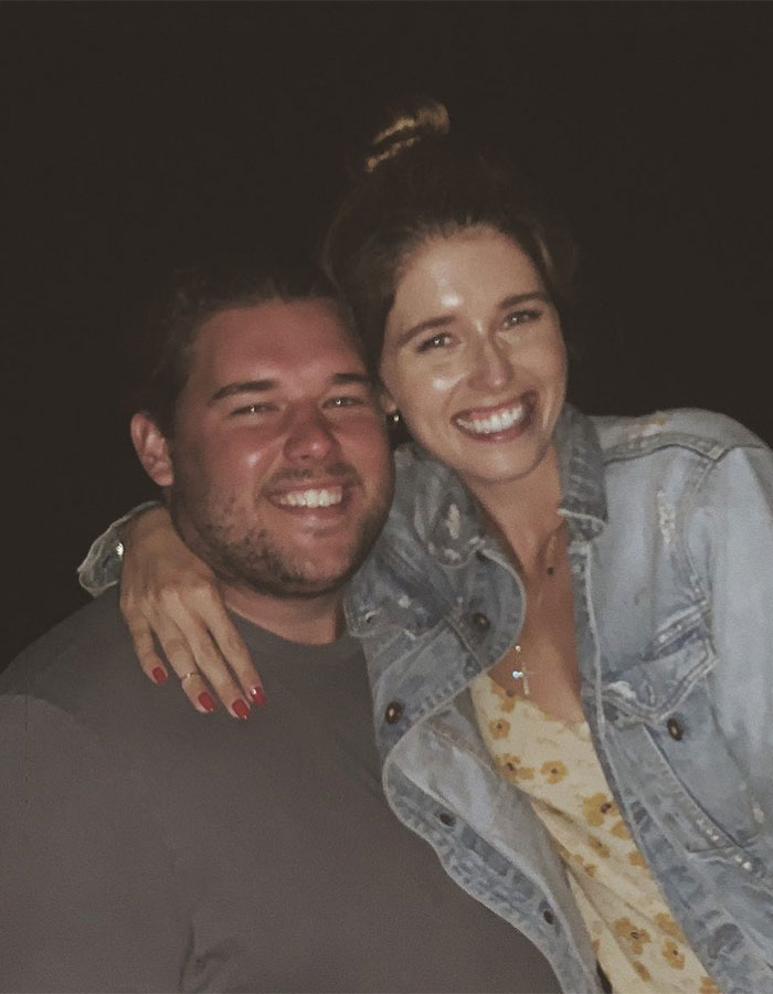 Smiling man in a gray shirt beside a woman in a denim jacket, highlighting impressive weight loss. Smiling man in a gray shirt beside a woman in a denim jacket, highlighting impressive weight loss.
