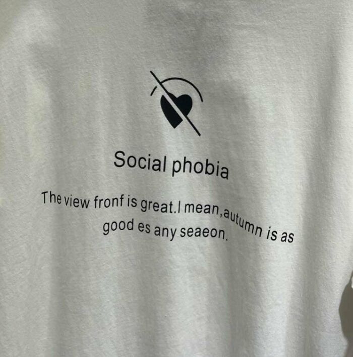 T-shirt with humorous mistranslation on social phobia theme, featuring nonsensical text about seasons.