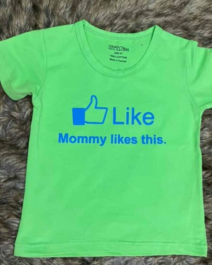 Green T-shirt with "Like Mommy likes this" text, humorously lost in translation.
