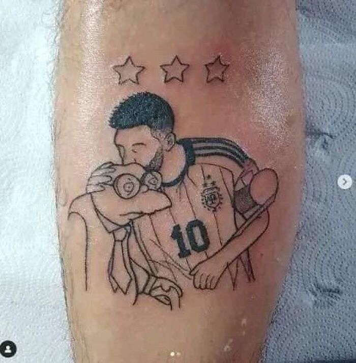 "Simpsons tattoo featuring a character hug on a calf, showcasing quirky fan art."