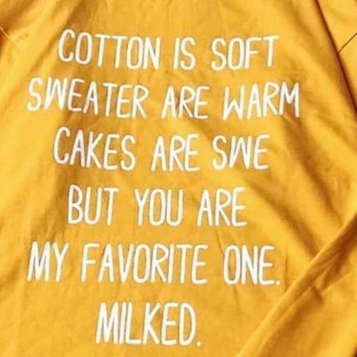 Yellow T-shirt with humorous mistranslated text about cotton, sweaters, and cakes.