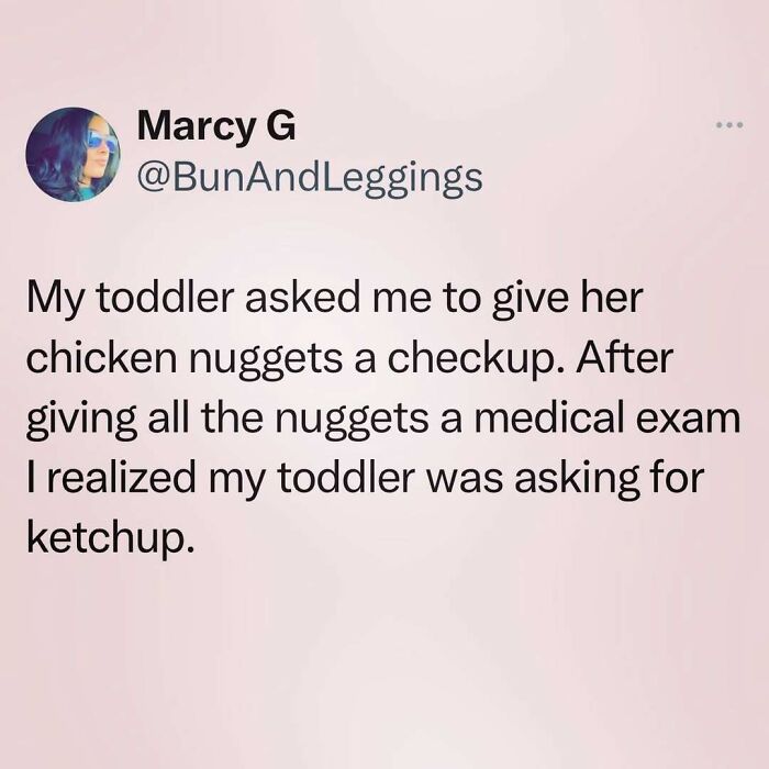 Tweet by Marcy G about a funny toddler experience involving chicken nuggets and ketchup confusion.