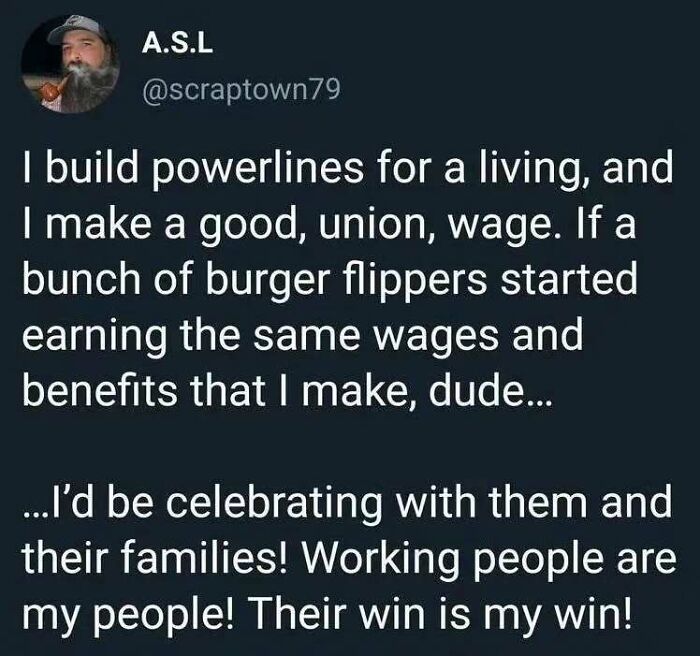 Text post about living in capitalism, supporting fair wages and celebrating workers' successes.
