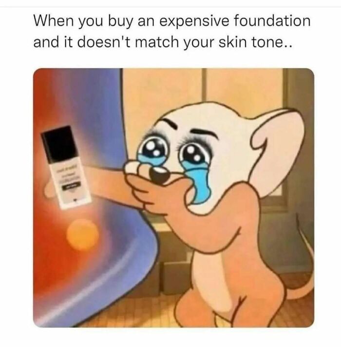 Cartoon character tearfully holding mismatched foundation, illustrating a relatable meme moment.