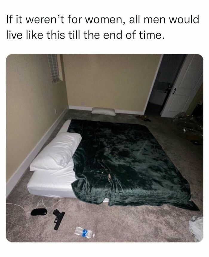 Empty room with a mattress on the floor, minimal decor, humorously depicting memes about men and their living style.