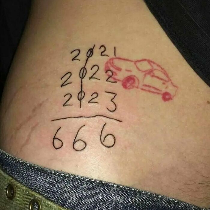 Tattoo mistake with years 2021, 2022, 2023, a car, and the number 666 inked on skin.