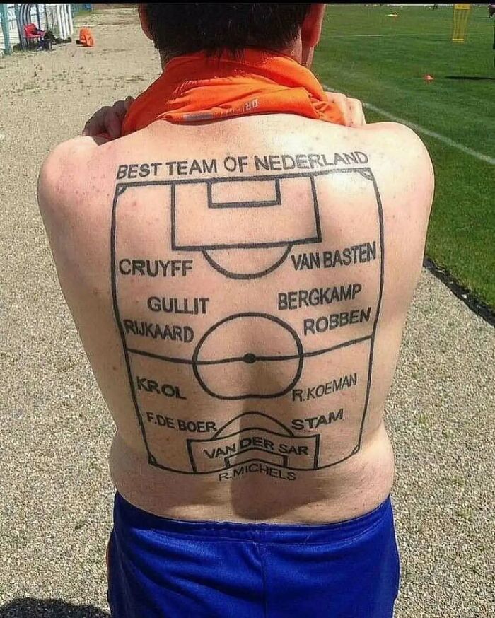 Man with a hilariously bad tattoos of a football lineup on his back.