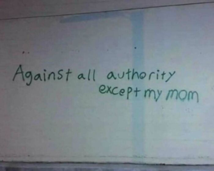 Graffiti reads: "Against all authority except my mom," reflecting a humorous take on philosophy.