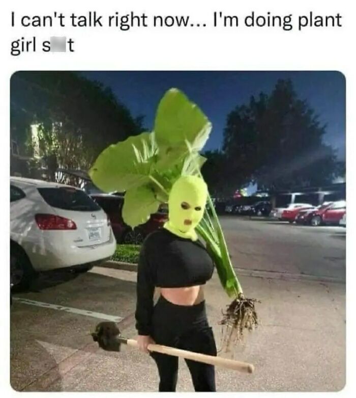 Person in a bright costume with leaves, mimicking a plant character, holding a garden tool, humorously representing plant owners.