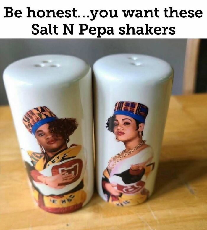 Salt N Pepa-themed salt and pepper shakers from Millennial Misery featuring vibrant graphics on a wooden table.