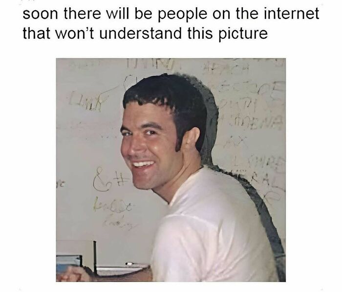Man smiling at the camera with text about internet understanding; meme from Millennial Misery.