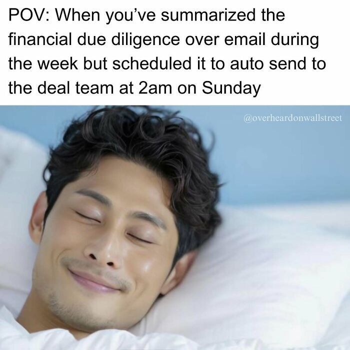 Man smiling in bed with eyes closed, meme text jokes about Wall Street email sent to deal team at 2am.