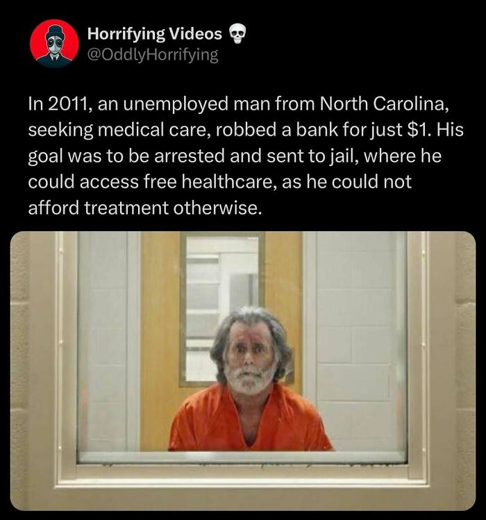 Man in prison through glass, wearing an orange jumpsuit. Oddly horrifying situation described in text above.