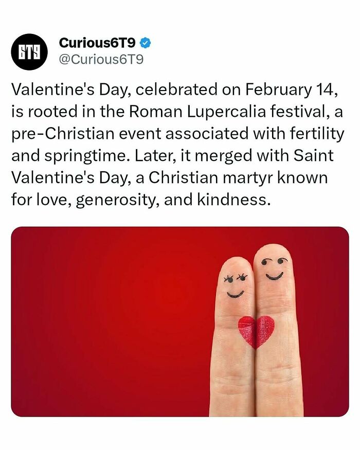 Two fingers with smiley faces and a heart against a red background, symbolizing Valentine's Day.