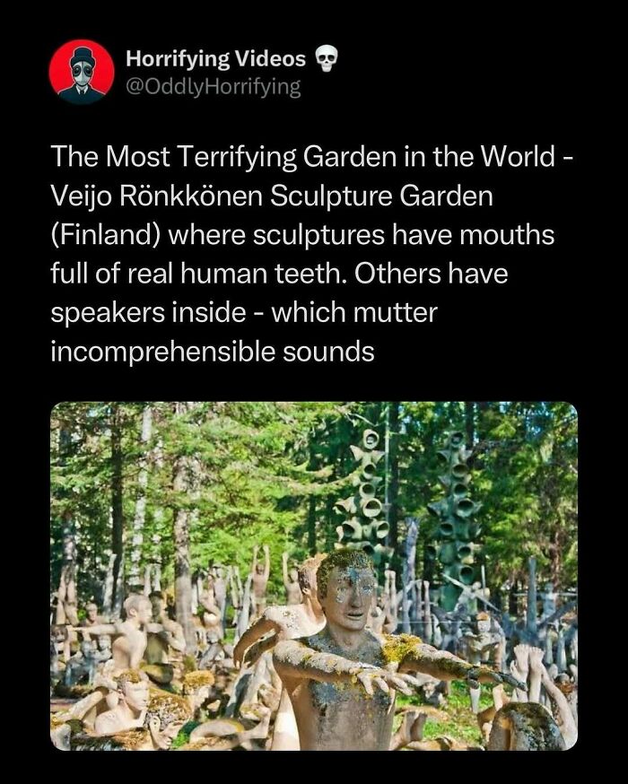 Oddly horrifying image of a sculpture garden with eerie statues having mouths full of teeth in a forest setting.