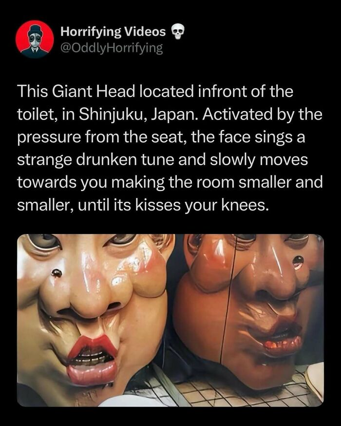 Oddly horrifying giant heads with eerie expressions in a Japanese restroom, creating an unnerving atmosphere.