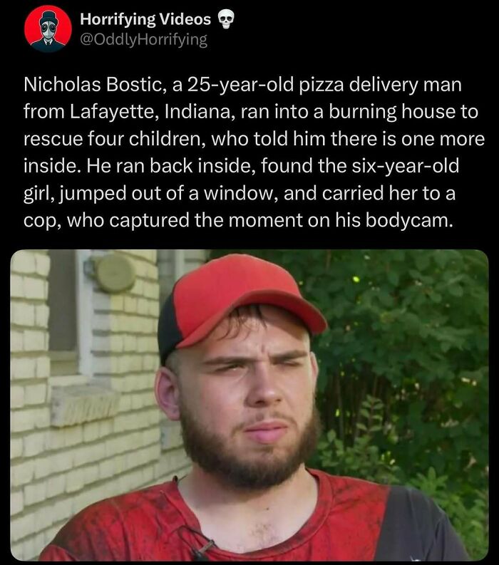 Man in a red cap and shirt, outdoors, related to unnerving rescue story from a burning house.