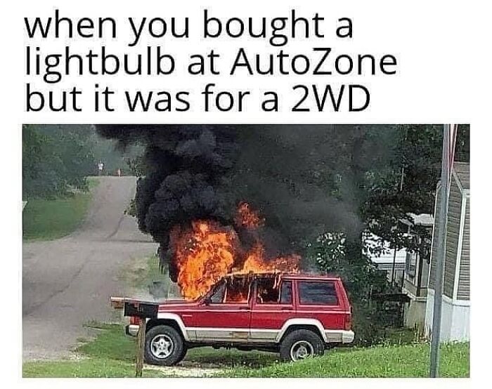 Burning red SUV with smoke, illustrating a humor car meme about buying the wrong part.