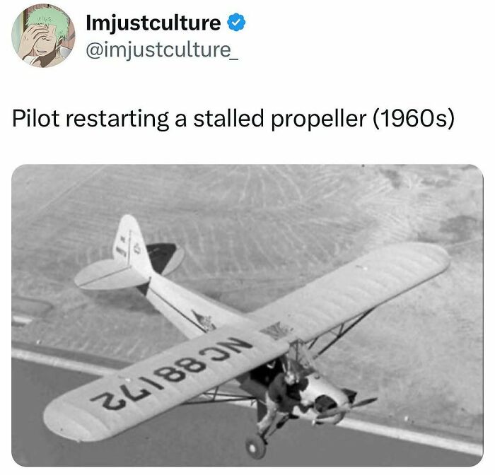 1960s pilot fixing a stalled propeller mid-flight.