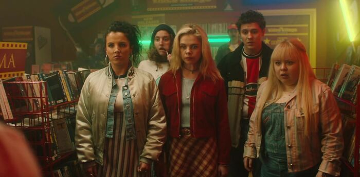 Group of young friends in a video store, scene from a show that remains consistently excellent.