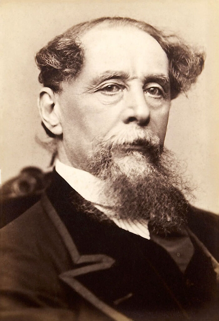 Rare photo of a famous historical figure with distinctive beard and formal 19th-century attire in a classic portrait style