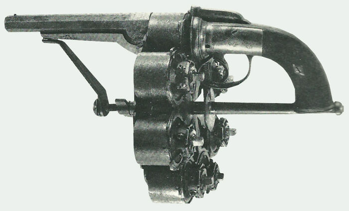 Historic multi-barrel pistol artifact showcasing firearm evolution and craftsmanship advancements.