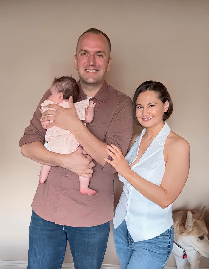 A couple with a baby smiling, highlighting Gypsy-Rose Blanchard's transformation and weight loss. A couple with a baby smiling, highlighting Gypsy-Rose Blanchard's transformation and weight loss.