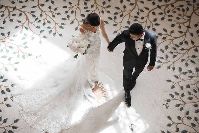 Groom Leads His Bride