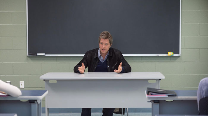 Actor at a school desk expressing frustration, highlighting issues with elite education rules. Actor at a school desk expressing frustration, highlighting issues with elite education rules.