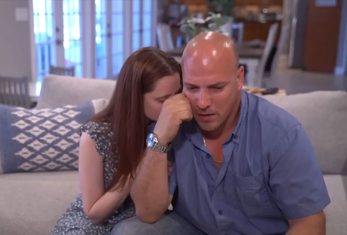 Man and woman sitting on a couch looking serious, related to infant car incident sentencing. Man and woman sitting on a couch looking serious, related to infant car incident sentencing.