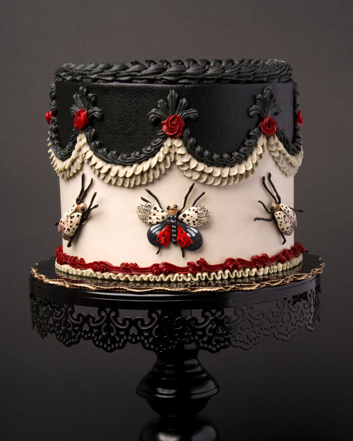 A visually stunning cake decorated with edible bugs and intricate designs by Vegan Treats.