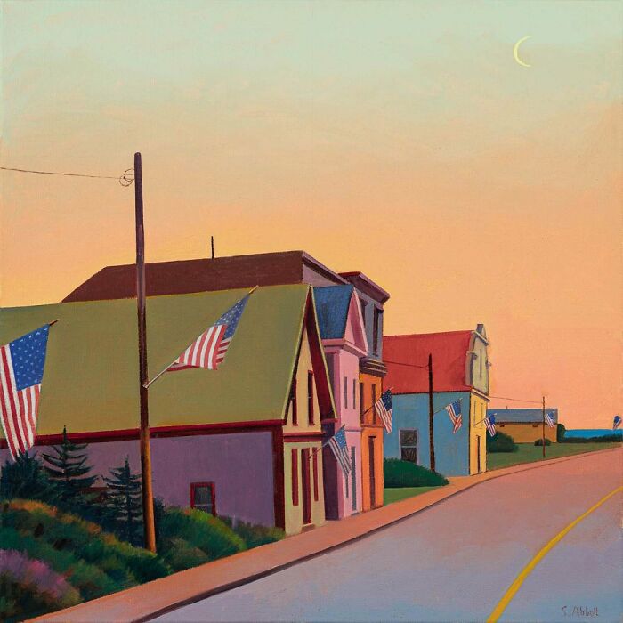 Quiet street painting by Susan Abbott featuring colorful houses and American flags under a sunset sky.