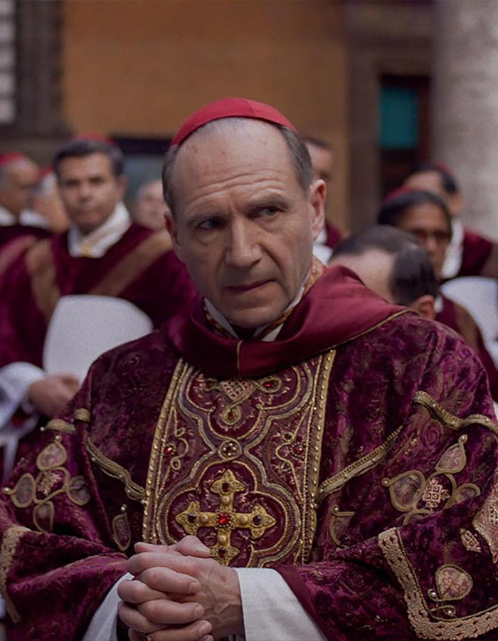 Man in ornate religious attire at a formal event, associated with Hollywood icon discussion. Man in ornate religious attire at a formal event, associated with Hollywood icon discussion.