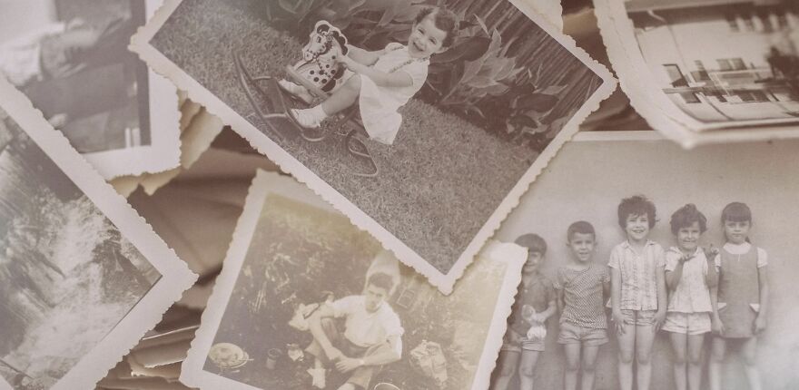 Old black-and-white photos of children, evoking ethical dilemmas and decisions.