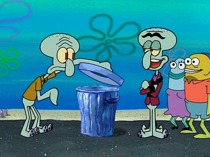 Cartoon character discovers obvious things by looking into a trash can while others watch and smile nearby.