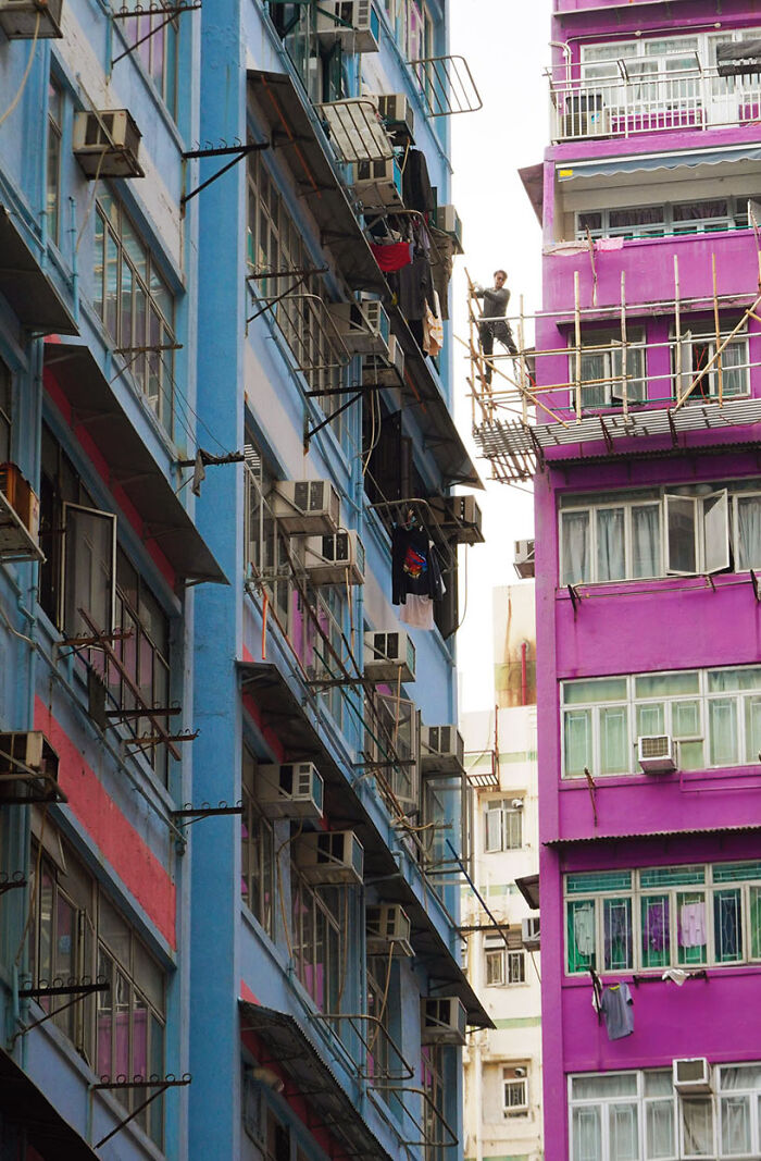 Stylish Fix, 2024 - A Man Is Attaching Bamboo Poles Together To Finish His Newly Built Scaffolding