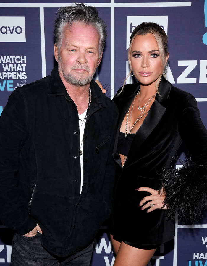 Father and daughter standing together at an event, highlighting an ongoing cancer battle.