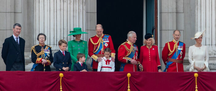 A royal family on a balcony wearing formal attire, illustrating obvious things you've just become aware of in tradition.
