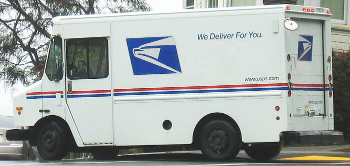 USPS mail delivery truck parked on street, representing companies that lost customers forever after service issues.